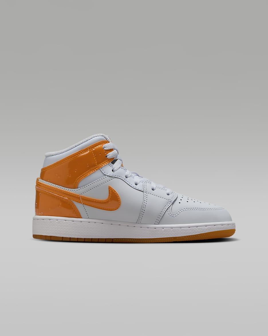 Air Jordan 1 Mid SE Big Kids Shoes. Nike
